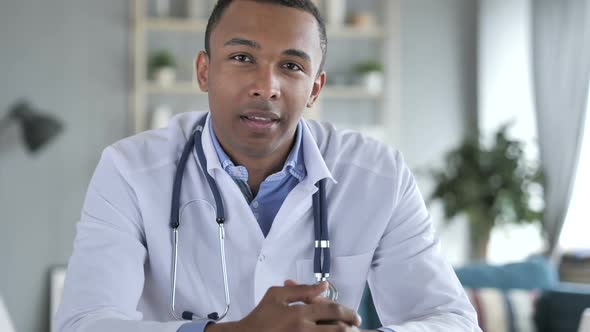 AfricanAmerican Doctor Talking with Patient Video Chat