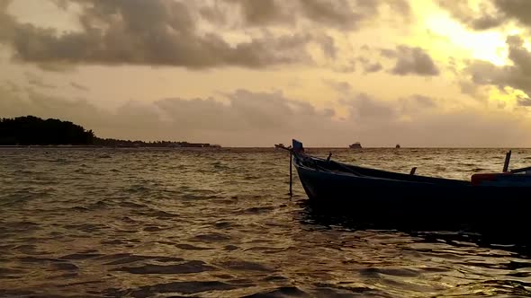 Sunny tourism of marine resort beach time by sea with sand background near resort