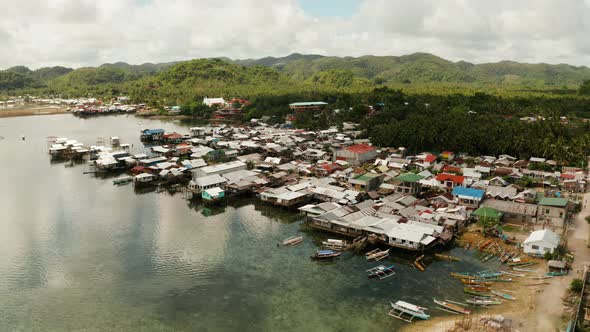 Fishing Village and Houses on Stilts. Dapa City, Siargao, Philippines.