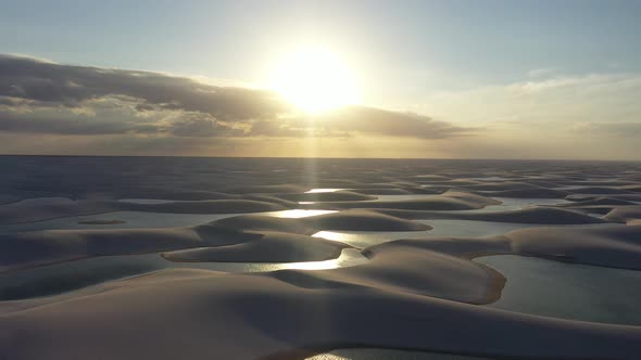 Sunset at Lencois Maranhenses Maranhao. Scenic sand dunes and rainwater lakes