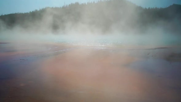 Otherworldly as boiling hot water and heat seeking bacteria create colorful patterns in the magnific