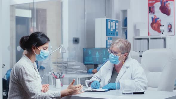 Young Woman at Doctor During COVID-19