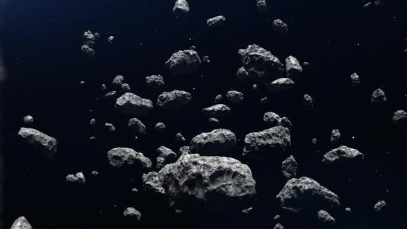 large number of asteroids flying in outer space spectacular video.