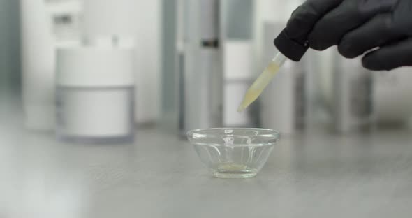 Cosmetology Hyaluronic Acid Is Poured Into A Vessel 