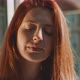 Attractive young woman with red hair, freckles and piercing - VideoHive Item for Sale