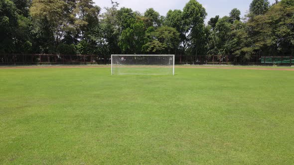 Aerial drone shot of a turf net in around soccer field