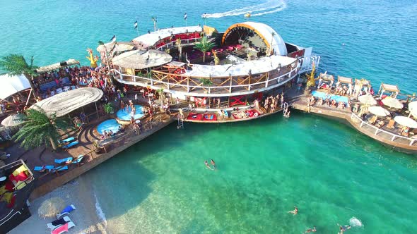 Aerial view of club stage on sea water, zrce beach on island of Pag