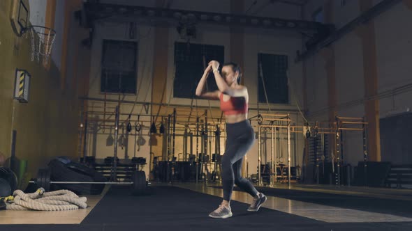 Young Woman Doing Exercise