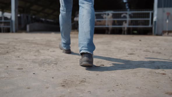 Unknown Farmer Legs Going for Work on Agriculture Products Manufacture Close Up