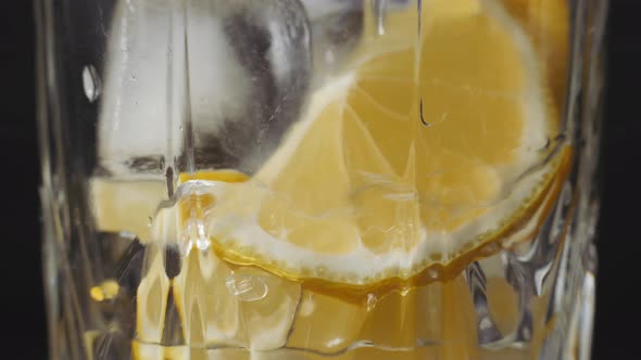 Close Up of Glass Water with Lime Lemon