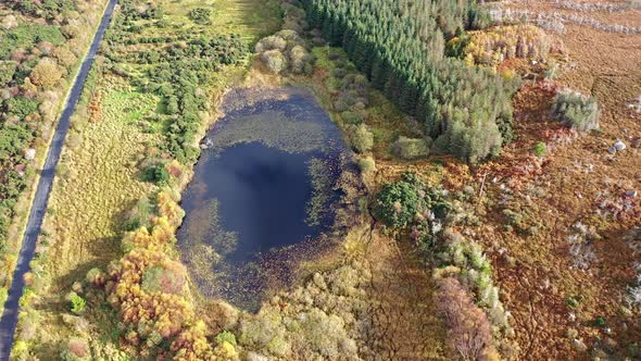 Aerial of Lake in a Peatbog By Clooney, Portnoo - County Donegal, Ireland