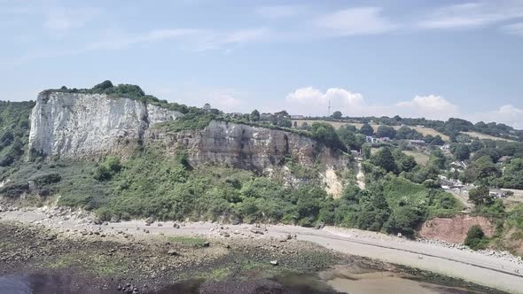 Aerial travelling shot of the Jurassic Coast Rock face.