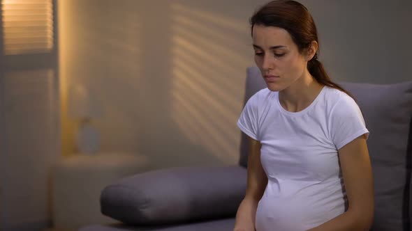 Poor Lonely Pregnant Lady Looking at Coins on Table, Lack of Money, Depression