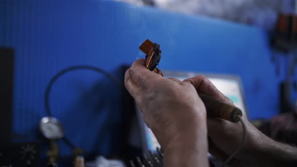 footage of soldering of automobile parts