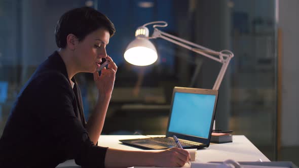 Businesswoman Calling on Smartphone at Dark Office 72