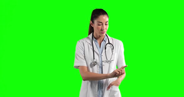 Animation of a Caucasian woman wearing surgeon blouse and scrumbs in a green background