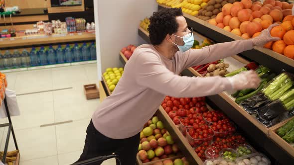 Mixed Race Buyer Wearing Face Mask in Supermarket