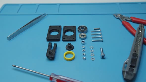 Zooming On Small Parts Screws Tools Bearings Prepared For Assembly