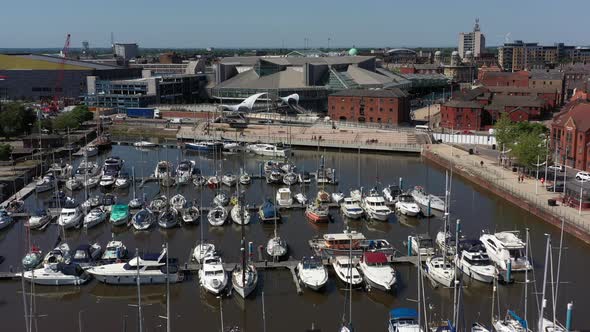 Low backwards aerial flight to reveal Hull Marina and the lock gates