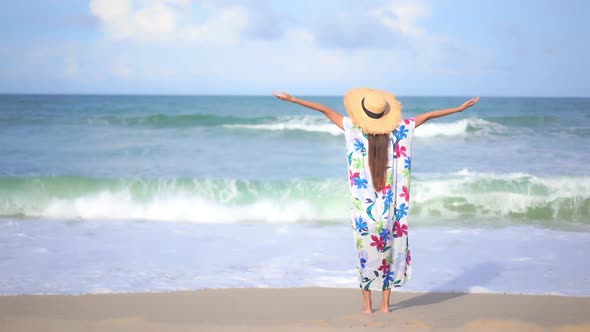 Asian woman enjoy around beautiful beach sea ocean