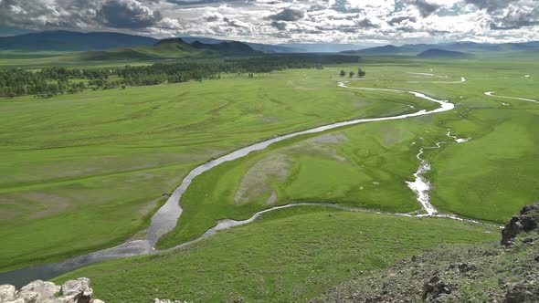 Vast Meadow and River in Central Asia Geography