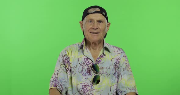 Senior Man Tourist Show Thumb Up and Smiles. Handsome Old Man on Chroma Key