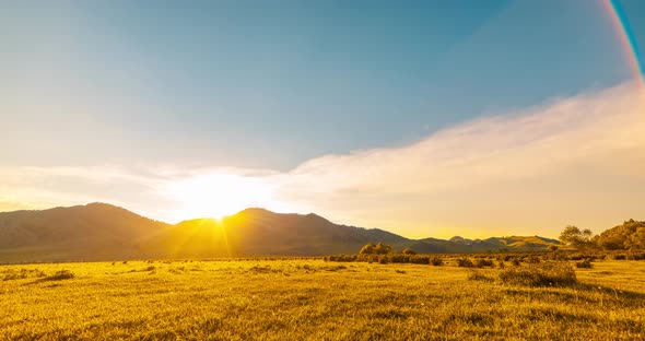 Mountain Meadow Timelapse at the Summer or Autumn Sunset Time