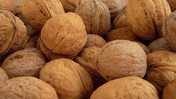 Walnuts on burlap. Shooting with a slider.