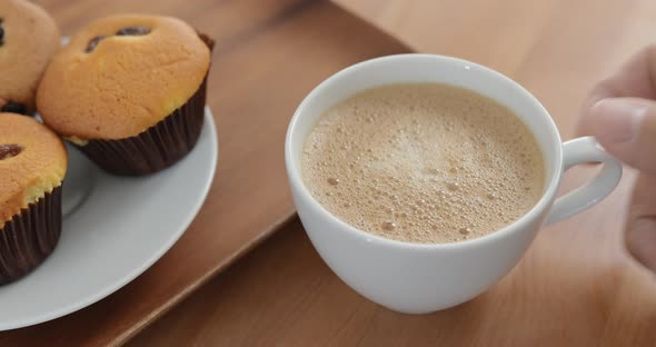 Breakfast with cupcake and coffee 