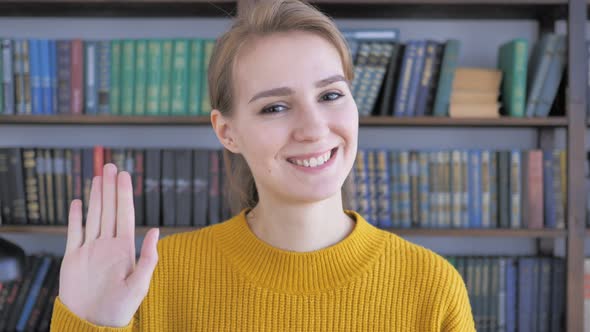 Hello, Young Woman Waving Hand to Welcome