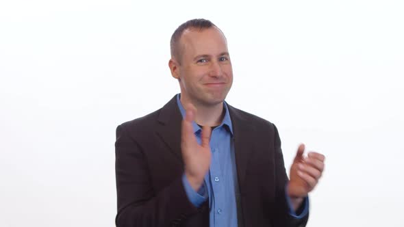 Happy man clapping on a white background.