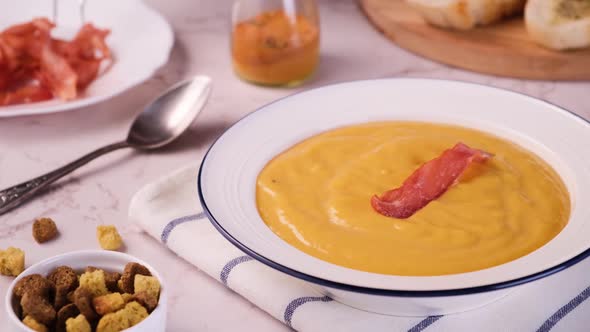 Pumpkin Cream Soup is Decorated with Jerky Meat Chips