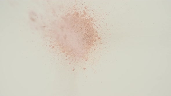Powder Particles of Cosmetics Fall on the Table
