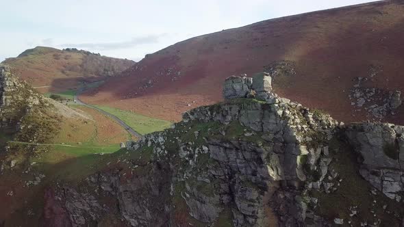 A Rocky Slope Under Clear Sky In The Valley Of The Rocks In North Devon, England. - Aerial Drone Sho