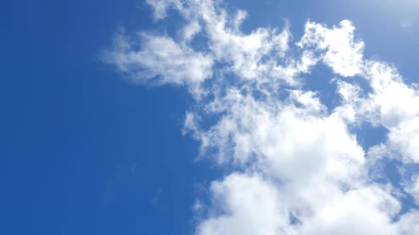 Clouds Flying on Blue Sky Background