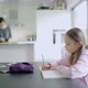Girl doing homework - VideoHive Item for Sale