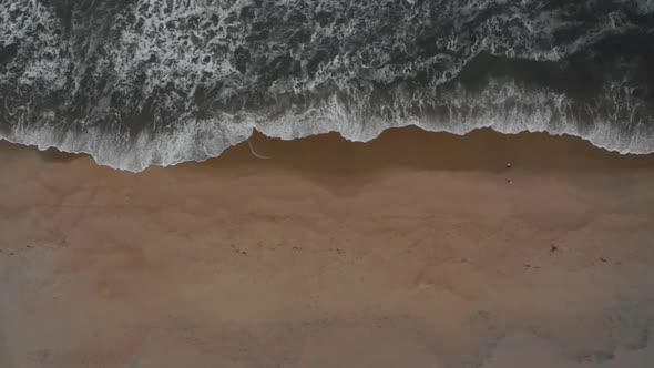 Moving aerial view of a beach