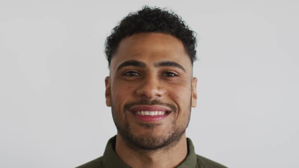 Portrait of mixed race man looking at camera and smiling