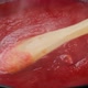 Stir tomato sauce with wooden spoon. 4K UHD video - VideoHive Item for Sale