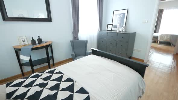 Cosy Black and White Bedrrom with Single Bed decorated with Stylish Furnitures