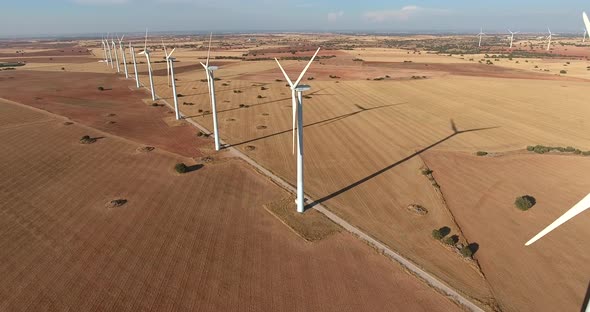 aerial view of a eolic wind mill park in countryside