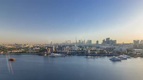 Dubai Creek Landscape Timelapse with Boats and Ship and Modern Buildings in the Background During