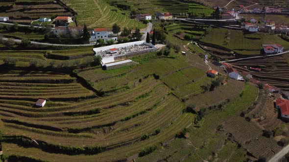 flying over villages in part of the huge vineyard industry for porto wines in the region of the dour