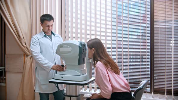 Woman Checking Her Visual Acuity with a Special Equipment