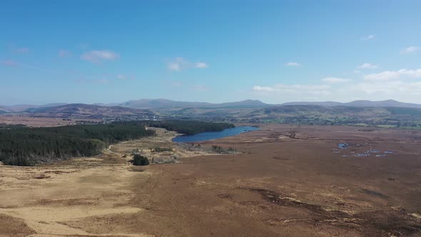 Aerial View of Peatbog and Lake Ananima Next to the Town Glenties in County Donegal  Ireland