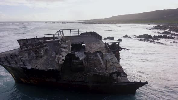 Aerial of old shipwreck in the ocean