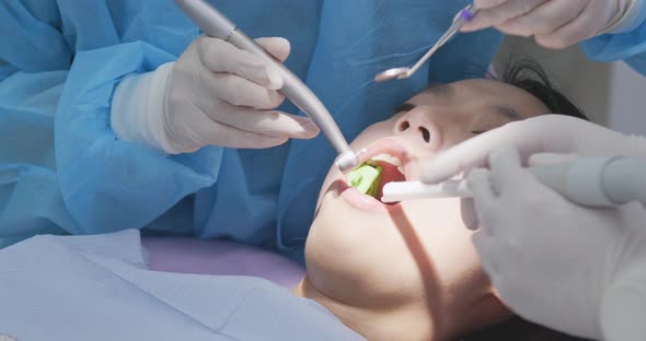 Woman having dental check up at dental clinic