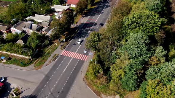 Crosswalk on the Road. Top View on Pedestrian Crossing and Highway. Drone Shot on Street with Cars