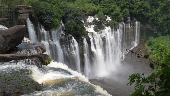 Stream of water falling down at the Kalandula Falls in Angola