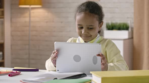 Little Cutie Using Tablet alt